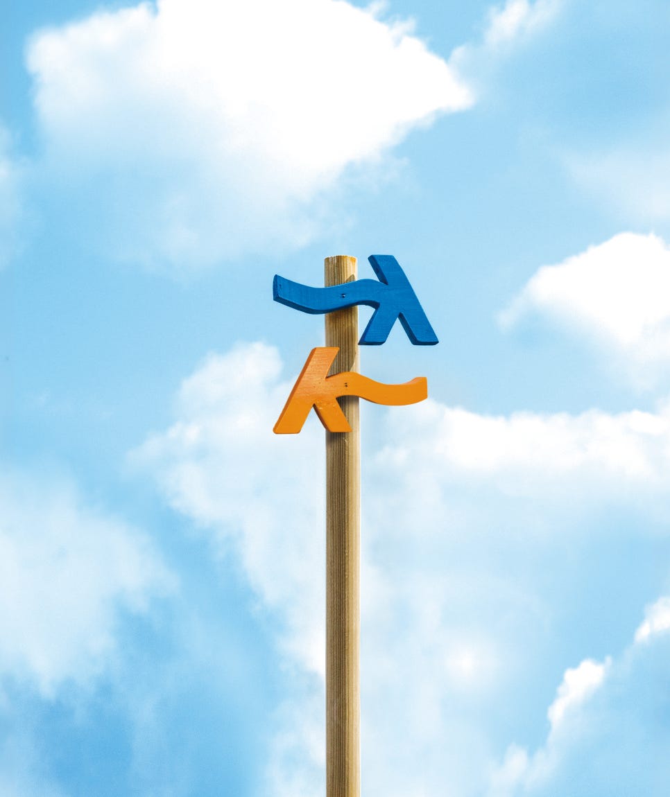 제주올레 길 화살표 : 파란색(정방향 표식), 주황색 (역방향 표식) / 사진=서명숙